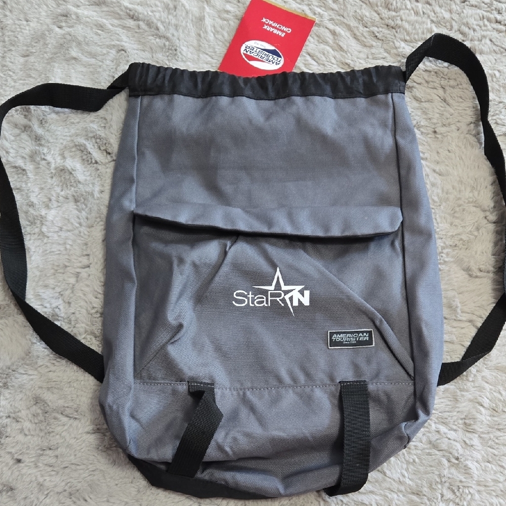 American Tourister drawstring canvas backpack w/ pockets